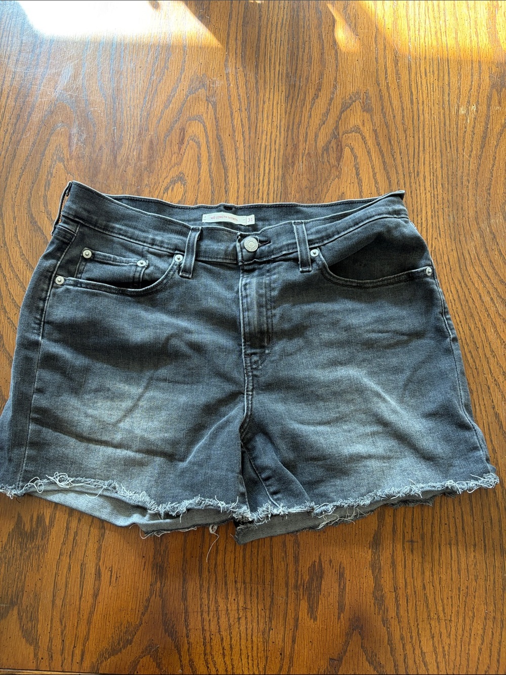 Levi's Black Distressed Denim Cutoff Shorts